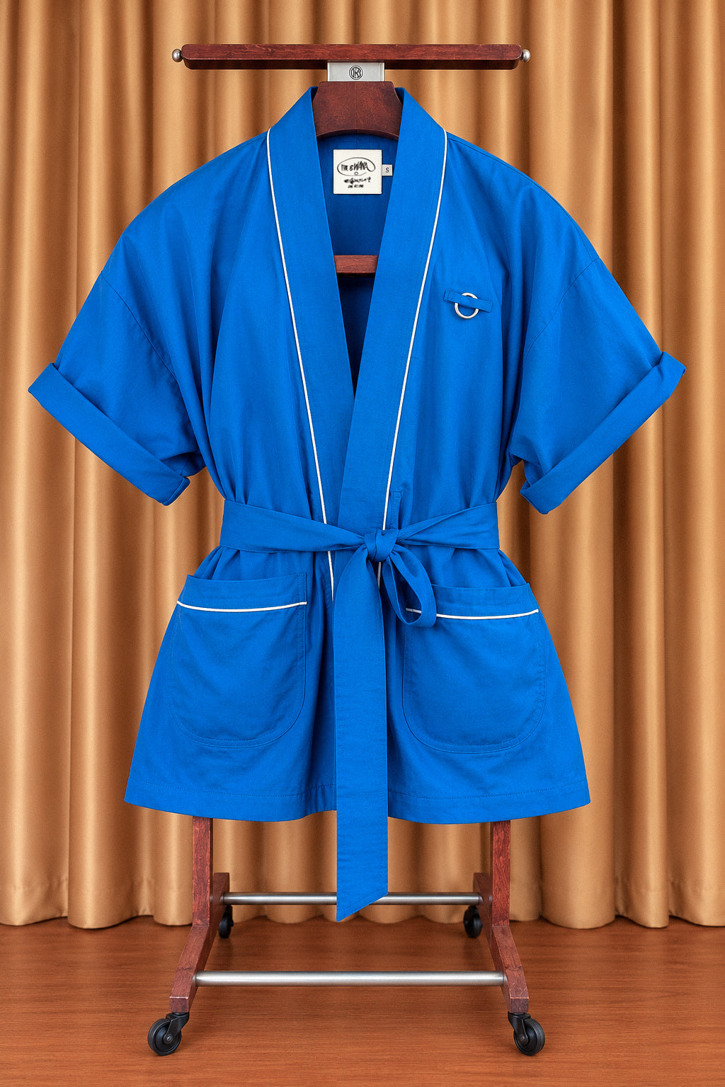 BLUE Bwana on a wooden valet stand