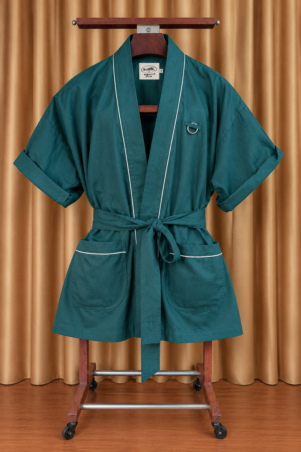 DEEP-GREEN Bwana on a wooden valet stand